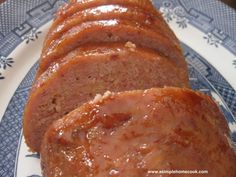 sliced meatloaf on a blue and white plate