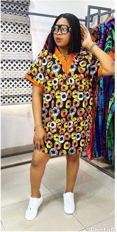 This gorgeous dress is suitable for every occasion. It's made with African Ankara.  All items are made from very high quality 100% cotton african print and this item is not an exception. If you would rather provide a custom size, please leave your bust, waist, hip and dress length measurements in the note to seller section when you order.    However, if you would like more fabric options, kindly let me know.  Thank you.  Kindly contact me if additional information is required. Thank you and happ Ankara Dress Styles Short Casual, Ankara Dress Styles Short, Ankara Shift Dress Styles, African Ankara Dresses, African Shift Dress, Ankara Shirt Dress, Ankara Shift Dress, Latest Ankara Dresses, Kitenge Dress