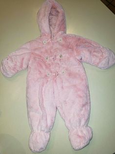 This is one BEAUTIFUL SNOWSUIT in a size 6/9 months, made by ROTHSCHILD. the mittens can be folded back if wanted. She will be toasty warm in this one mom. Very gently worn, no damages!! the length from the top of the shoulders to the bottom of the booties measures 26 inches. no damages. SUPER soft!! All of our items are from a smoke free home. we do our best to describe them as we see them. if for any reason you are not pleased with an item, please let us know. we do NOT refund s/h fees for any Cute Pink Winter Onesie, Cute Pink Hooded Onesie, Pink Snow, Retro Baby, Baby Fits, 9th Month, Button Flowers, Baby Outfits, Girl Stuff