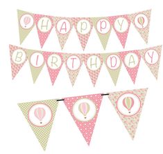 pink and green birthday banner with hot air balloons on it's buntings