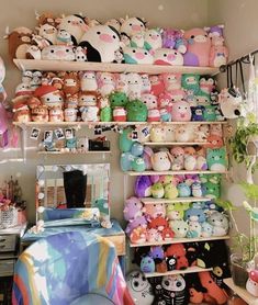 a room filled with lots of different kinds of stuffed animals on shelves next to each other