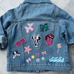 Name Will Appear On Top Or Middle Of Jacket. Dm For Yours Today. Prices Range On Jacket Size And Patches. $85-$110 Cute Denim Jacket With Pockets For Winter, Fun Cotton Outerwear For Fall, Playful Denim Jacket With Pockets For Fall, Playful Blue Long Sleeve Outerwear, Blue Denim Jacket For Playtime In Fall, Blue Denim Jacket For Fall Playtime, Fun Winter Outerwear For Playtime, Playful Blue Outerwear For Playtime, Fun Long Sleeve Outerwear For Playtime