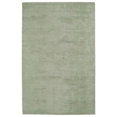 a light green rug on a white background