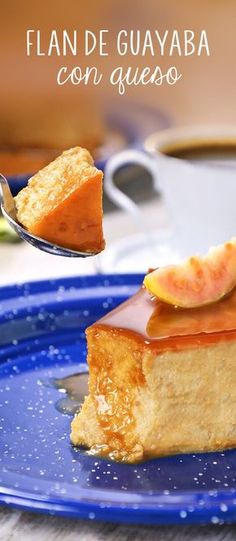 a piece of cake on a blue plate with a spoon