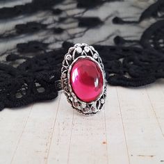 Vintage Czech glass rose pink jewel domed cabochon in a sturdy, adjustable silver plated filigree ring.  The ring is adjustable to fit approx size 6 upwards, and has a comfortable, floral patterned band. The cabochon is 3/4 inch (18 mm) from top to bottom. It is a mid to heavy weight ring. The ring has a chunky, vintage feel - I could imagine it being worn at court.  This ring is gift boxed. Also available separately in black, emerald green, and dark sapphire blue. Vintage Feeling, Gothic Rose, Glass Rose, Pink Jewels, Gothic Vintage, Dark Sapphire, Jewels Rings, Rose Vintage, Ring Antique