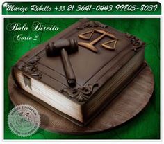 a cake with an image of a judge's book and gavel on top