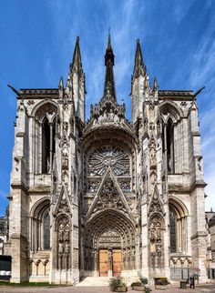 an old cathedral with many windows and doors