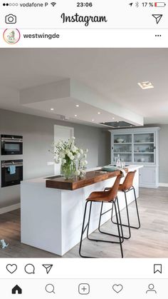 an instagram page with two bar stools in front of a kitchen island and oven