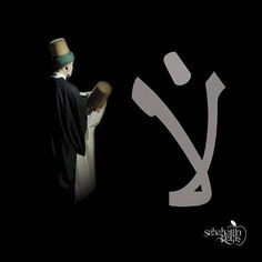 a man with a hat and cape standing in front of a black background that has the letter k on it