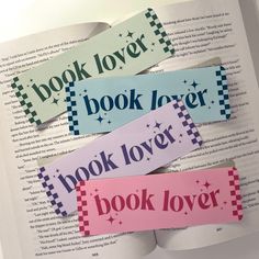 four bookmarks with words on them that read books lover