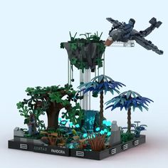 a lego model is shown with an airplane flying over the trees and plants in front of it