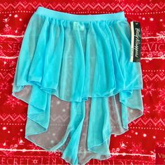 Brand New With Tags. Size Xs/S Light Blue Stretch Mini Skirt, Light Blue Stretch Skirt, Blue Stretch Tiered Mini Skirt, Stretch Blue Tiered Skirt, Light Blue Lined Skirt For Party, Light Blue Flowy Skirt For Party, Blue Fitted Tiered Mini Skirt, Flowy Light Blue Party Skirt, Blue Stretch Skirted Bottoms