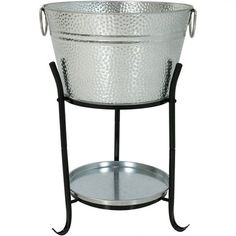 a metal ice bucket on a stand