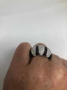 Vintage black and white sapphire ring 925 Sterling Silver Setting Size 6.5 Can be resized, my jeweler charges $10-$20 All rings are shipped free in the US in a nice gift box. Check out our over a THOUSAND great reviews Engraving is $4 per letter and is not always perfect depending on the piece. It can take a few days if the jeweler is busy. This is payable to Paypal Judithsltd@gmail.com Gift Black Diamond Sterling Silver Ring, Black Diamonds Round Diamond Ring For Gift, Gift Black Diamond Round Ring, Gift Black Diamond Ring, Black Jewelry With Pave Setting For Gift, Black Channel Set Rings For Anniversary, Anniversary Black Channel Set Rings, Saphir Ring, Silver Cocktail