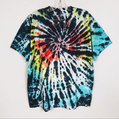 Check Out This Rainbow & Black Spiral Tie-Dyed Tee! This Is A Two-Process Tie-Dye With The Rainbow Dyed First And Then The Black Dyed Over Top. Euc! Washed Only Twice To Rinse The Dye. Never Worn! Width A2a = 23.5” Length = 28.5” 100% Cotton I’m Happy To Answer ?S Or Respond To Your Offer! Happy Poshing! 070521fe25 Black Hand Dyed Tops For Spring, Spring Black Hand-dyed Tops, Hand-dyed Black Tops For Summer, Tie Dye Rainbow, Tops Black, Black Hole, Tie Dyed, The Rainbow, Black N Yellow