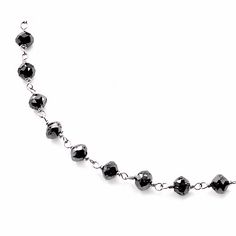 Our beautiful fancy-black diamond beaded necklace has a total diamond weight of 30 carats. This 38 inch long necklace is made with a highly polished 14k white gold chain. Single Strand Diamond Bead Jewelry, Faceted Black Spinel Necklace, Elegant Black Spinel Jewelry With Faceted Beads, Luxury Black Necklace With Polished Beads, Luxury Black Jewelry With Polished Beads, Black Faceted Round Bead Jewelry, Luxury Black Polished Beads Jewelry, Luxury Black Polished Bead Jewelry, Luxury Black Round Beads Jewelry