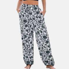 Introduce a classic touch to your casual wear with our Black & White Floral Elastic Waist Tapered Leg Pants. These pants feature a timeless floral design in black and white, paired with a comfortable elastic waist for easy wear. The Black & White Floral Elastic Waist Tapered Leg Pants are a stylish and practical addition to any wardrobe, offering a perfect balance of comfort, versatility, and on-trend design. Product code: CAA02D4E007AC Kick Flares, Bottom Clothes, Pull On Pants, Casual Fits, Easy Wear, Bottoms Pants, Tapered Legs, Leg Pants, Black Pants