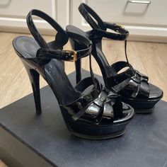 Black Patent Leather Tribute Platform Sandals High Heel With Gold Accents. Great Condition, Barely Used, Size 6.5. Comes With Box. Evening Patent Leather Platform Heels, Patent Leather Platform Sandals With Open Heel, Sleek Patent Leather Platform Heels, Luxury Patent Leather Platform Sandals, Saint Laurent Platform Heels, Saint Laurent Shoes, Gold Accent, Black Patent Leather, Platform Sandals