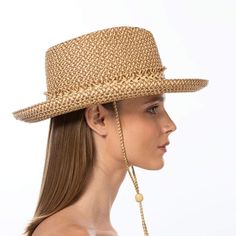 Tucson is a designer woman's sunhat for sale made of Squishee®. The modified Western shape has a fringe edged band and a self bolo braid chin strap with a wood bead to adjust and secure it. The signature logo rivet is discretely placed at the back of the crown. The wired brim permits shaping; push up the sides for more Western flare, or flatten them out for additional shade. Squishee® is a man-made material incorporating recycled fibers. It looks and feels just like natural raffia but has the ad Adjustable Natural Boater Hat With Short Brim, Adjustable Natural Color Western Sun Hat, Summer Adjustable Natural Fedora, Adjustable Woven Fedora With Curved Brim, Adjustable Natural Fedora For Summer, Adjustable Natural Summer Fedora, Adjustable Brown Woven Fedora, Adjustable Country Style Panama Hat For Kentucky Derby, Adjustable Fringe Hats