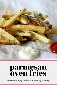 this is an image of parmesan oven fries with ketchup and mayonnaise