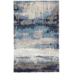 an abstract rug with blue and beige colors