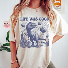 Vintage Dinosaur Ufo Retro T-Shirt, Dinisaur Vintage Tatt0o Style Shirt, Unisex Funny Dino T Shirt, 90s Minimalistic Graphic Tee, Fun Dinosaur Gifts old school 90s Style Graphic T-Shirt, Retro Raccoon Shirt, Trendy Shirts, Adult Unisex Relaxed Shirt, Washed Tee, Life Was Good Dinosaur T-Shirt, Vintage 90s Dino T-shirt, Funny 90s Shirt, Vintage Minimalistic Unisex Tee, Silly Shirts, Funny Gifts Retro Browse our selection of more shirts/sweatshirts ------ https://www.etsy.com/shop/KenzAmericanTee? 90s Shirts Graphic Tees, Silly Shirts, School 90s, Vintage Dinosaur, Good Dinosaur, Silly Shirt, Raccoon Shirt, Dinosaur Gifts, The Good Dinosaur