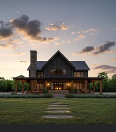 a house that is in the middle of a grassy field with steps leading up to it