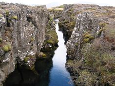 there is a river between two large rocks