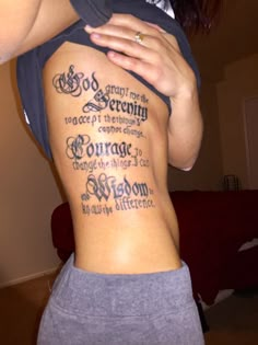 a woman with a tattoo on her back showing the names of different people and places