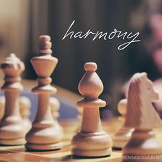 a chess board with the words harmony on it