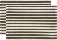 two black and white striped rugs