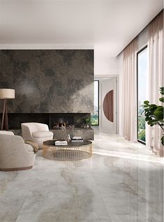 a modern living room with marble floors and walls, along with two white chairs and a round coffee table