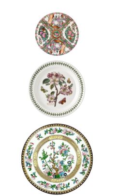 three plates with different designs on them