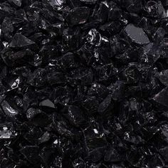 black marble is shown in this close up photo, it looks like they have been cut into pieces