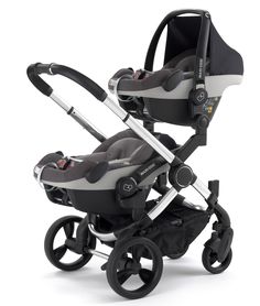 the stroller is black and grey with silver trim