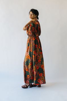 Unleash your inner flower child with The Renlund V-Neck Pleated Midi Dress! Made with a gorgeous brown floral pattern, this dress features a playful v-neck and flattering pleats. Perfect for any occasion, it's sure to make a statement without taking itself too seriously. Details self: 100% polyester lining: 97% polyester + 3% spandex Fabric Care Guide Here Sizing & Fit Measurements are approximate and taken while laying flat across the front. Not doubled. small: bust = 24"; waist = 14"; length = Brown Floral Print V-neck Dress, Brown V-neck Dress For Garden Party, Brown Floral Print Maxi Dress For Garden Party, Brown Floral Print V-neck Maxi Dress, Brown V-neck Maxi Dress With Floral Print, Textured Sweater, Detailed Sweater, Pleated Midi Dress, Brown Floral