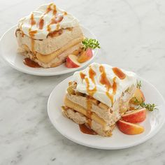 two white plates topped with desserts on top of a marble countertop next to each other