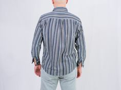 "UNCLE ED PRESENTS - vintage 90's striped corduroy shirt - long sleeve - 2 pockets on the chest - materials: no label, probably cotton CONDITION (1-10 ❶❷❸❹❺❻❼❽ Good vintage condition SIZE/MEASUREMENTS size from label: M best fits men: S/M chest: 45,5 inches (116 cm) length: 30 inches (76 cm) sleeve length from armpit: 20,5 inches (52 cm) The model is 6'1\" (186 cm), measures 41-35-39 (104-88-100 cm) and wears size L" Casual Long Sleeve Shirt With Vertical Stripes, Long Sleeve Shirt With Vertical Stripes For Fall, Vertical Stripes Long Sleeve Shirt For Fall, Fall Long Sleeve Shirt With Vertical Stripes, Cotton Shirt With Vertical Stripes For Fall, Fall Cotton Shirt With Vertical Stripes, 90s Striped Long Sleeve Tops, Casual Vertical Stripes Shirt For Fall, 90s Style Relaxed Fit Long Sleeve Shirt