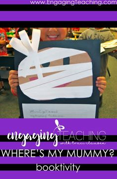 a child holding up a sign with the words engaging teaching where's my mommy?