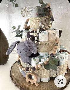 a cake made out of burlaps and stuffed animals