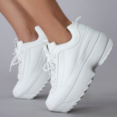 Unleash Your Inner Visionary With The Lily 5005 Dream Cypher White Platform Sneakers From Berness. This Rave Platform Sneakers Features White Colored Vegan Leather Upper, Stitch Detailing On The Sides, Lace Up Closure, Chunky Rubber Platform Sole. These Super Lightweight Rave Platform Sneakers Will Get You Going From Day To Night. Lily 5005 Dream Cypher White Platform Sneakers Vegan Leather Upper Super Lightweight Lace Up Closure Chunky Platform Outsole True To Size White Sports Platform Sneakers With White Laces, White Synthetic Platform Sneakers, White Flat Heel Platform Sneakers, Chunky Lace-up Sneakers With Cushioned Footbed, White Ankle-high Wedge Sneakers, Synthetic Platform Sneakers With Laces, Spring Platform Sneakers With White Laces, Ankle-high Synthetic Platform Sneakers With Cushioned Footbed, Ankle-high Platform Sneakers With Cushioned Footbed