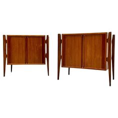 pair of mid century modern teak and walnut sideboards, circa 1950's