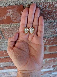 "Sparkly crystal teardrop stud earrings from Napier. Dress up or down from weddings to wine night. Measurements .75\" x .50\" Marked Napier and copyright symbol, please see photo. These pierced earrings feature a faceted glass rhinestone in a high polish gold tone bezel. No chips or cracks in the stone. New push backs included. In excellent vintage condition. Please message me with any questions." Pear-shaped Crystal Earrings For Anniversary, Nickel-free Teardrop Crystal Earrings For Anniversary, Nickel Free Teardrop Crystal Earrings For Anniversary, Gift Pear-shaped Crystal Earrings, Copyright Symbol, Adored Vintage, Wine Night, Floral Pins, Crystal Stud Earrings