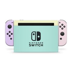 three nintendo switch controllers sitting side by side on top of each other, one pink and one blue