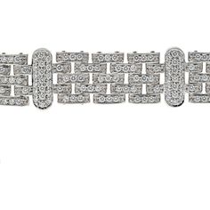 Savor the journey through the world of exquisite detailing and design in this breathtaking 18K White Gold 10.00 carat total weight Five Row Diamond Link Ladies Bracelet. Crafted with meticulous attention to detail, this bracelet is a masterpiece that exudes luxury and sophistication.Each of the five rows features dazzling round diamonds set in a secure link design, creating a harmonious flow of brilliance and elegance. The total carat weight of 10.00 carat total weight ensures a captivating sparkle that will mesmerize onlookers with every movement.The bracelet is approximately 20mm wide, making it a statement piece that commands attention and complements any outfit effortlessly. It is secured with a box clasp adorned with a safety feature, ensuring both style and peace of mind.Meticulously Luxury Platinum Bracelet With Pave Setting, Luxury Diamond Cut Bracelet, Luxury White Gold Chain Bracelet With Pave Setting, Luxury Platinum Bracelets With Diamond Accents, Luxury Diamond Bracelet With Pave Setting For Formal Occasions, Luxury Formal Chain Bracelet With Pave Setting, Luxury Bracelets With Pave Setting For Formal Events, Luxury Bracelets With Pave Setting For Formal Occasions, Luxury Platinum Tennis Bracelet Hand Set