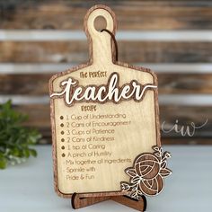 a wooden teacher's recipe sign on a table