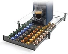 an espresso machine filled with lots of cups