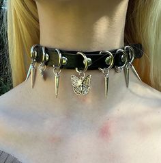 A whimsi-goth choker to add some silvery sparkle into your outfit.  The first picture shown has two of the same choker worn at once, layered!  Coming in the typical buckle style closure at the back and standard length. I do have a small neck but it's on the tightest setting, otherwise it can go easily 3 inches larger. Check out the other options I have available on my page! Clearing out lots of my collection. Edgy Metal Choker For Cosplay, Alternative Metal Choker For Cosplay, Adjustable Grunge Choker For Cosplay, Edgy Black Choker For Cosplay, Black Punk Choker For Cosplay, Adjustable Punk Choker For Cosplay, Adjustable Punk Style Choker For Cosplay, Adjustable Emo Choker For Cosplay, Adjustable Metal Choker For Cosplay