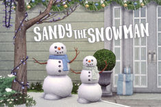 two snowmen standing in front of a house with the words sandy the snowman on it