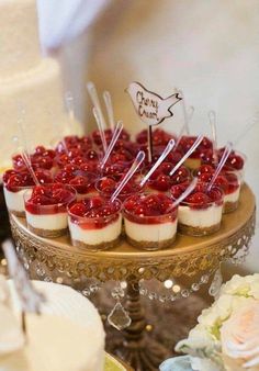 small desserts are arranged on a cake stand